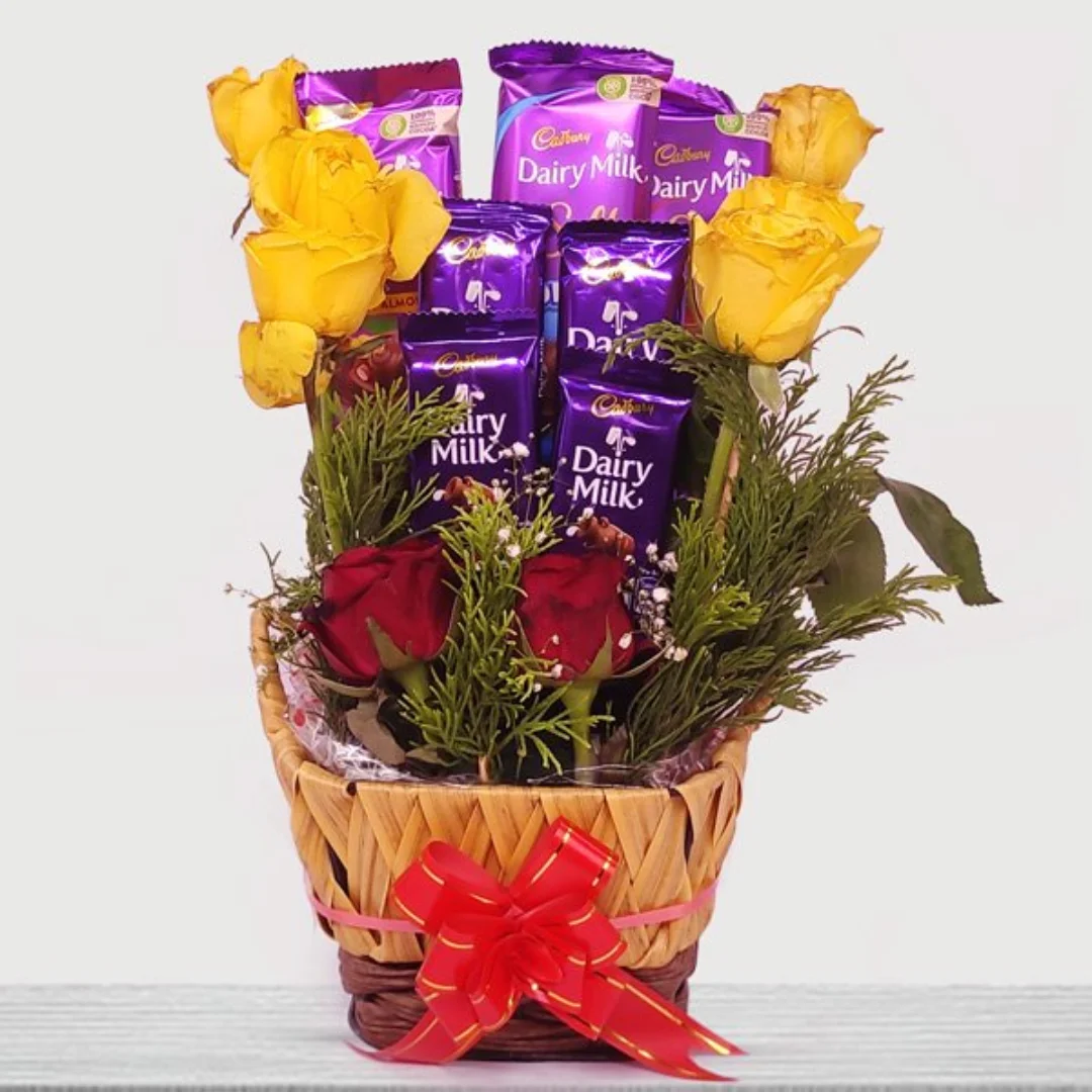 Cadbury Chocolates Basket with Yellow and Red Roses: Sweet Surprises